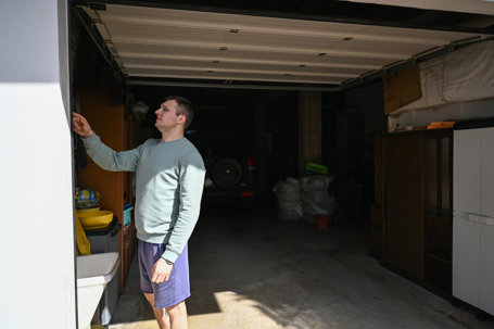 man worried about his garage door